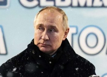 Russian President Vladimir Putin delivers his speech as he attends a flag-raising ceremony for newly-built nuclear submarines at the Sevmash shipyard in Severodvinsk in Russia's Archangelsk region, Monday, Dec. 11, 2023. The navy flag was raised on the Emperor Alexander III and the Krasnoyarsk submarines during Monday's ceremony. Putin has traveled to a northern shipyard to attend the commissioning of new nuclear submarines, a visit that showcases the country's nuclear might amid the fighting in Ukraine. (Kirill Iodas, Sputnik, Kremlin Pool Photo via AP)