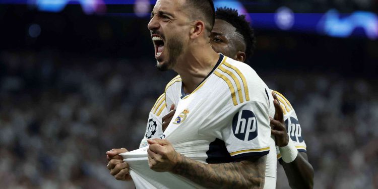 epaselect epa11327918 Joselu of Real Madrid celebrates after scoring the 1-1 goal during the UEFA Champions League semifinal second leg soccer match between Real Madrid and Bayern Munich, in Madrid, Spain, 08 May 2024. EPA/JUANJO MARTIN