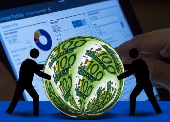 Banconote da 100 euro e PC