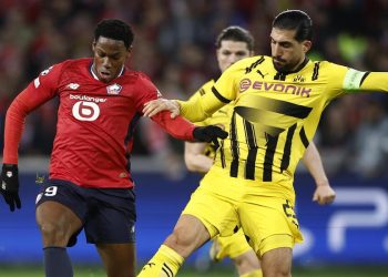 Jonathan David contro Emre Can in Lille Borussia Dortmund (Foto ANSA)