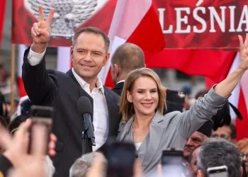 Karol Nawrocki con la moglie Marta Nawrocka (Ansa)