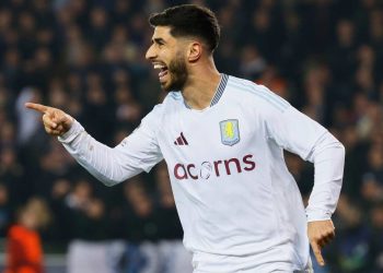 Aston Villa's Marco Asensio celebrates after an own goal by Brugge's Brandon Mechele made it past Brugge's goalkeeper Simon Mignolet during the Champions League round of 16 first leg soccer match between Club Brugge and Aston Villa at the Jan Breydel Stadium in Bruges, Belgium, Tuesday, March 4, 2025. (AP Photo/Geert Vanden Wijngaert)