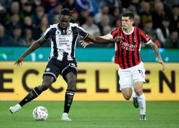 Solet dell'Udinese braccato dal milanista Pulisic (Foto Ansa)