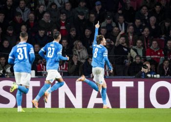 L'esultanza del Napoli in Champions League dopo un gol di McTominay (Foto Ansa)