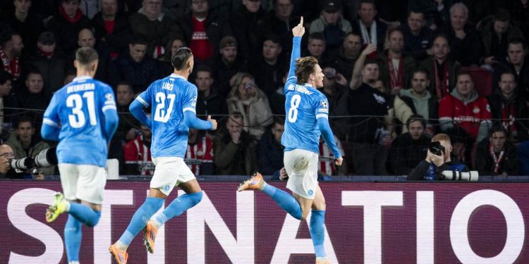 L'esultanza del Napoli in Champions League dopo un gol di McTominay (Foto Ansa)