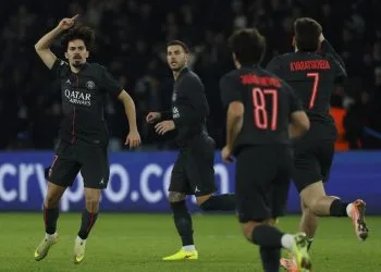 Vitinha esulta dopo un gol col PSG in Champions League (Foto Ansa)