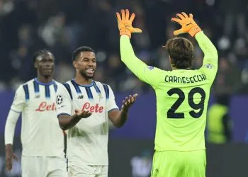 Hien e Carnesecchi esultano con l'Atalanta in Champions League (Foto Ansa)